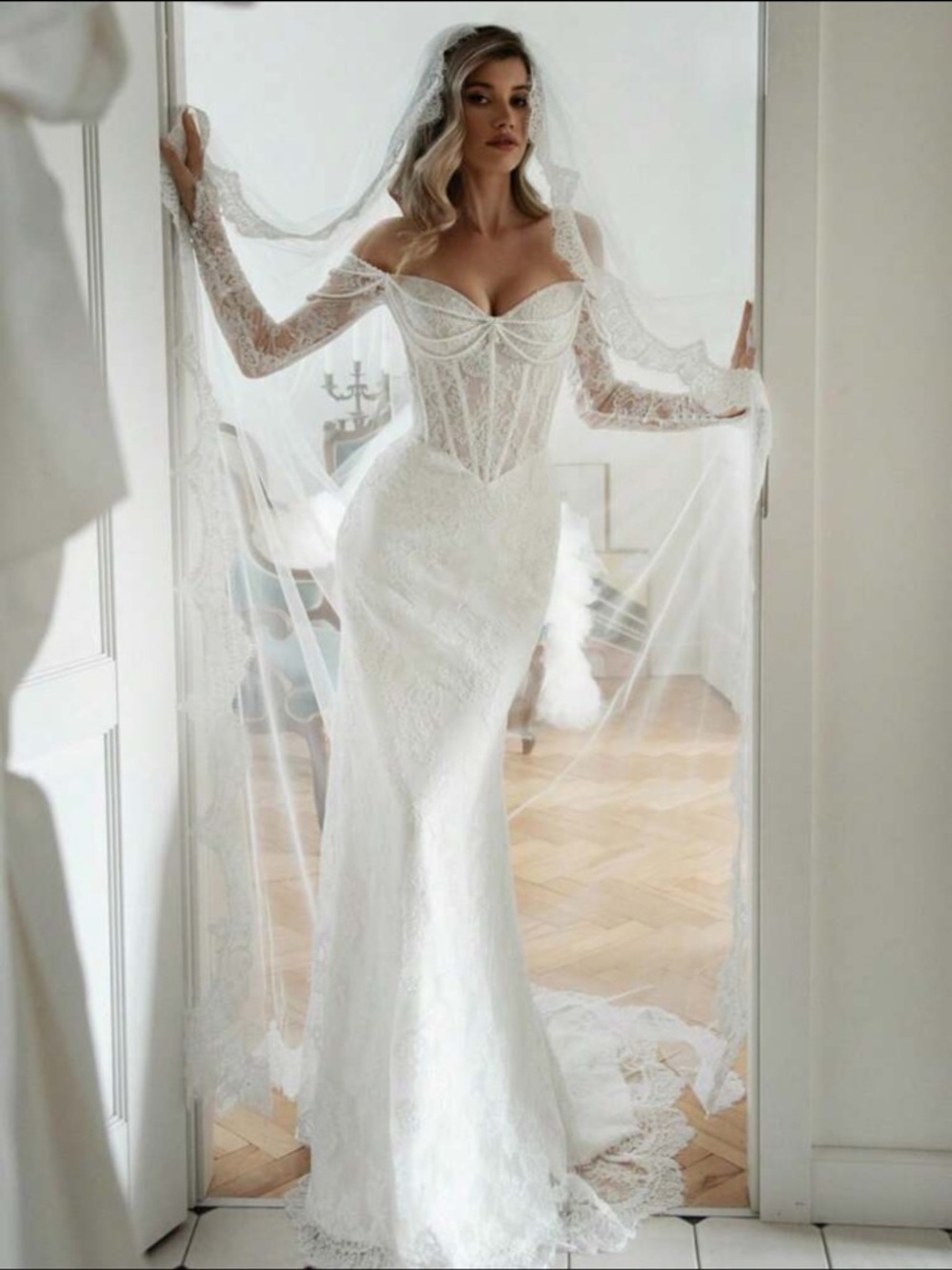 Elegant White Lace Off-Shoulder Bridal Gown with Corset Bodice